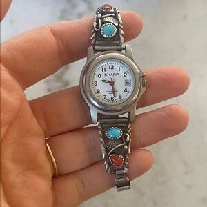 Sharp Women's Silver Watch with Turquoise and Red Accents
